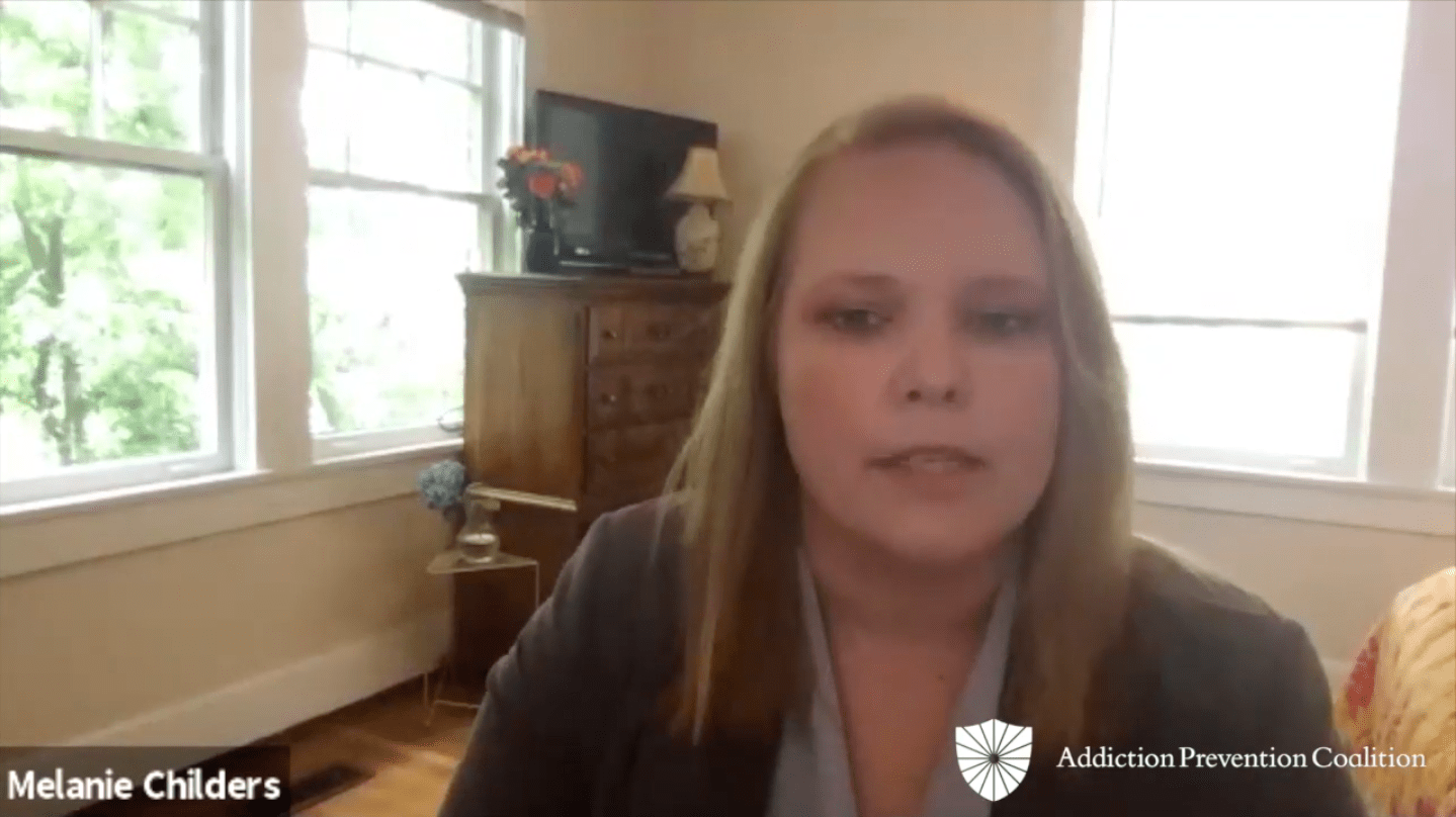 Melanie Childers, LPC addresses the audience